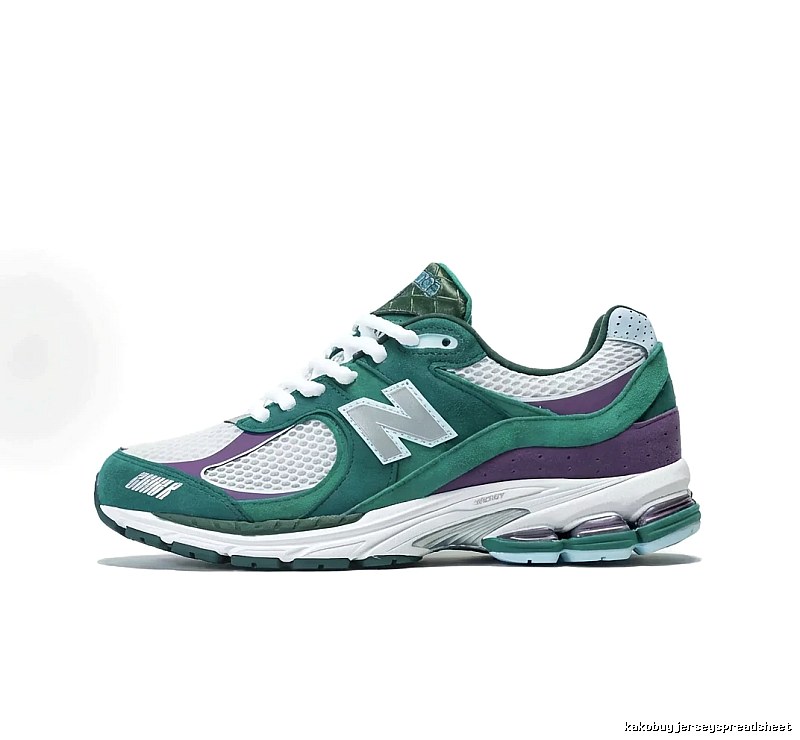 Retro-style green and purple sneakers of New Balance
